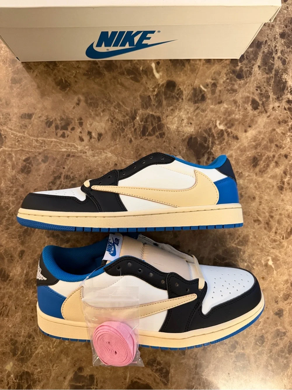 Jordan 1s Low Fragments x Travis Scott’s  DS with box and extra pink laces